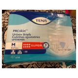 14- Tena- medium unisex briefs- new