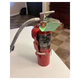 Charged fire extinguisher
