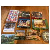 10 assorted puzzles in boxes