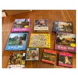 10 assorted puzzles in boxes