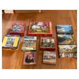 10 assorted puzzles in boxes
