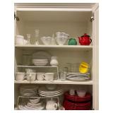 Cabinet full of plates, dishes, and glassware