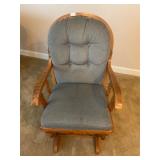 Wood and bluish, gray fabric glider rocker