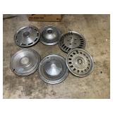 6 vintage hubcaps