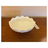 Footed milk glass hobnail bowl