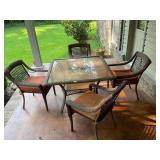 Nice wicker and glass patio table and chairs