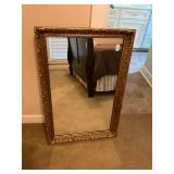 Framed gold colored mirror 24 x 36