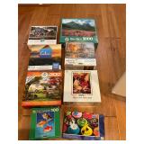 10 assorted puzzles in boxes