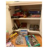 Large assortment of puzzles and games