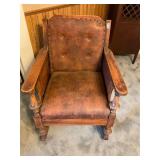Wood and leather style antique rocker