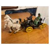 Vintage cast iron horse and wagon coach