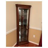 Lighted corner curio cabinet