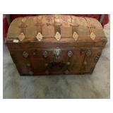 Vintage wooden and Rose painted camelback trunk