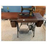 Antique treadle base singer sewing machine