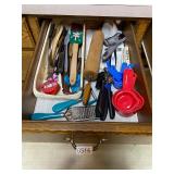 Drawer full of cooking utensils