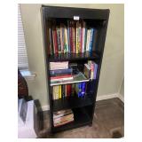 Black shelf and books