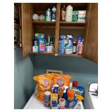 Cabinet/washer top full of cleaning supplies ï¿½ all