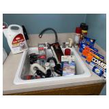 Sink full of home fix it, etc. supplies ï¿½ all