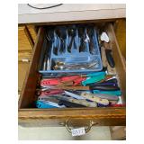 Drawer full of eating utensils