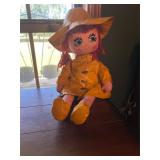 Doll in raincoat