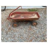 Vintage red metal wagon