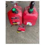 2- 2 gallon plastic gas jugs ï¿½ half full