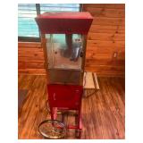 Rolling popcorn maker machine