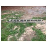 20 ft extension ladder. Bent on end a little