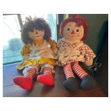 2 raggedy Anne dolls