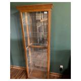 Lighted curio hutch with glass shelves