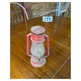 Red and clear globe lantern
