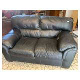 Leather like loveseat