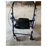 Seated mobility walker