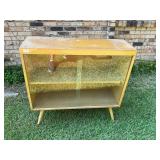 Vintage yellow glass front wood cabinet