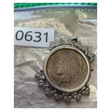 1922 silver dollar in broken bezel.  ****