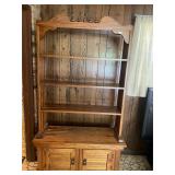 Wooden shelf with doors on bottom