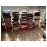 Large Assortment of Books by door