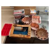 Chopper, cake pans, pastry press all