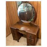 Antique vanity with round mirror