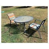 Round patio table and two chairs