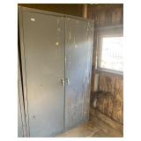 Two door metal cabinet 4 wide, 2 deep, 6.5 high