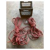 2- extension cords and milk crate