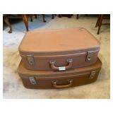 Pair of vintage brown suitcases
