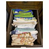 2 drawers of dish towels and potholders