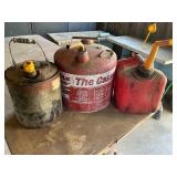 3 assorted gas cans/ jugs