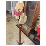 Wooden hat rack and hats
