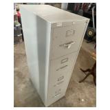 Nice 4 drawer file cabinet. No key