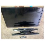 Samsung 46ï¿½ flat screen, remote, and wall hanger