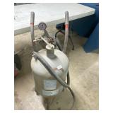 Central pneumatic sand blaster