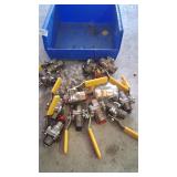 Bin of brass vavles